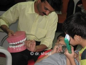 dr shirol15 Dr Shirol teaching about ill effects of thumb sucking to kids