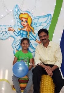 dr shirol8 child posing with doctor