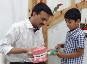 dr shirol9 teaching oral hygiene technique